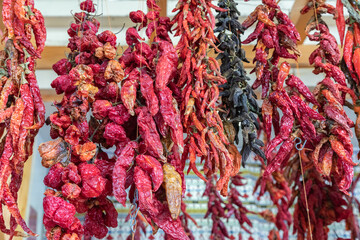 Dried Red, Orange and Yellow Chili Peppers at an Outdoor Market in Madeira, Portugal - 782597677