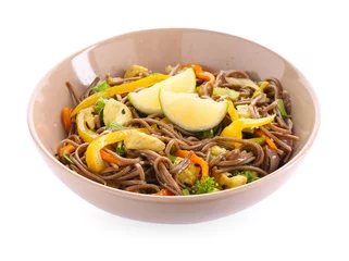 Rolgordijnen Stir-fry. Delicious cooked noodles with chicken and vegetables in bowl isolated on white © New Africa