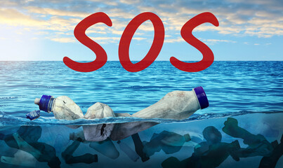 Word SOS and plastic garbage in ocean. Marine pollution