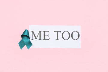Teal ribbon and paper with text ME TOO on pink background. Sexual Assault Awareness Month