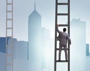 Young businessman climbing career ladder - 782616213