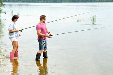 couple spending time fishing together - 782617292