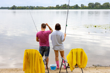 couple spending time fishing together - 782618202