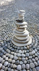 Poster Zen stones on sand, stacked stones in balance © lin
