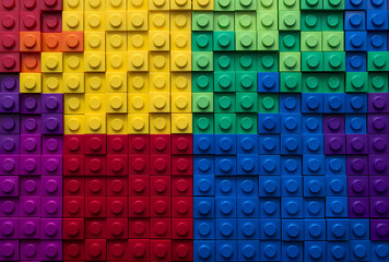 A grid of lego bricks in different colors - obrazy, fototapety, plakaty