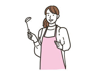 キッチンで料理をするエプロン姿の女性
