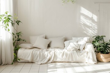 Minimalist living room, white sofa, green plants.
