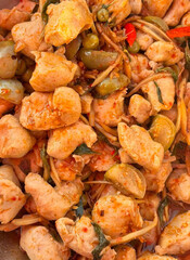 fried chicken with vegetables and spices