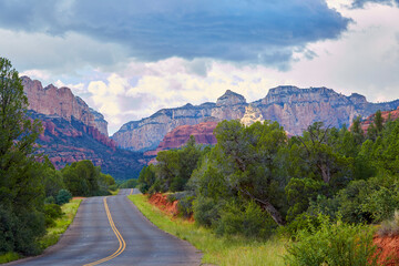 Scenic winding road through red rocks of Sedona Arizona USA on a beautiful road trip