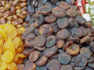 Market Counter with Dried Eastern Delights: Apricots and Dried Peaches in a Variety of Colors