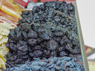 Taste of Eastern Traditions: An Assortment of Dried Fruits at a Market Stall