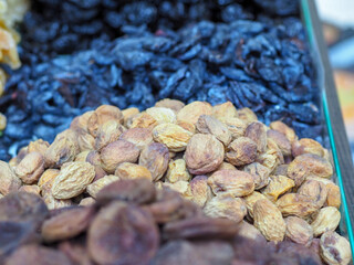 Dried Peaches at an Eastern Market Stall: A Palette of Flavors and Aromas