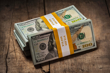 stacks-of-100-dollars-banknotes-bundles