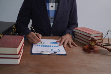 Male lawyer, skilled in jurisprudence, navigates legal matters, drafting contracts, advising...