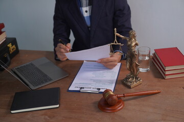 Male lawyer, skilled in jurisprudence, navigates legal matters, drafting contracts, advising...