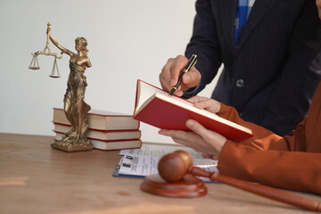 Male lawyer, skilled in jurisprudence, navigates legal matters, drafting contracts, advising...