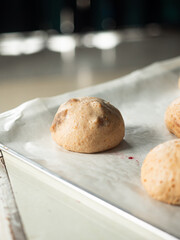 fig bread bun dough on baking tray