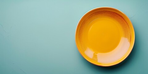 Yellow Bowl on Blue Table. Generative AI