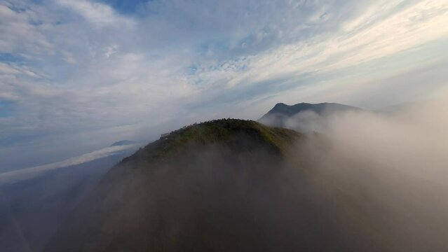 flying with an fpv drone on the peak of mount andong, magelang, central java