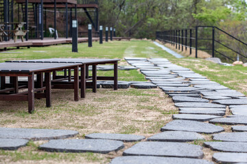 View of the empty bench and table in the garden of the cafeteria