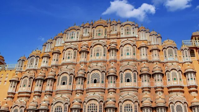 Hawa Mahal time lapse on a sunny day, Jaipur, Rajasthan. Beautiful window architectural element.