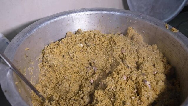 Close-up of hot biryani in a large vessel. Hot Biryani in an Indian restaurant.