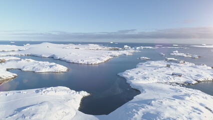 Fototapeta na wymiar Antarctica Polar Ocean Seascape Aerial Flight View. North Antarctic Open Water Glacier Landscape Island Overview. Climate Change at Nature Coast Drone
