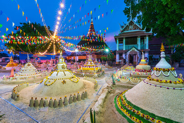 PHITSANULOK, THAILAND - April 11,2024:Thai people come to build the sand Pagoda for return the sand to the temple on Songkran festival Thai tradition at Ratchaburana temple in Phitsanulok,Thailand.