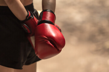Close up red boxing gloves, copy space