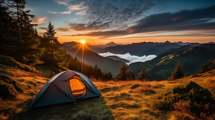 Camping tent high in the mountains. tourist tent camping in mountains at sunset - 782844083