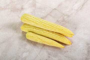 Raw sweet baby corn heap