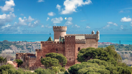View of the Ruins of the castle of Casteldefels with the mediterranean sea in the background,...