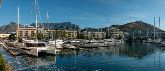 The marina district of Cape Town with table mountain and signal hill in the background, South Africa