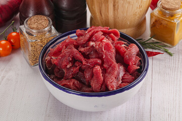 Raw beef meat - sliced strips