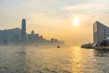 Cityscape of Hongkong Skyline from Victoria Harbour during evening and night in Tsim Sha Tsui , Hongkong : 26 March 2024 - obrazy, fototapety, plakaty