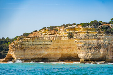 Coastal view of the beaches and caves in Algarve, Portugal.