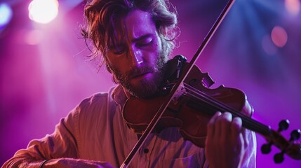 Fototapeta premium A passionate musician plays the violin with emotion