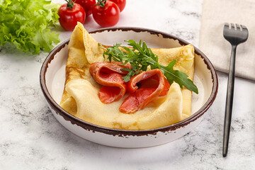 Russian pancake with salmon fish