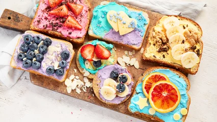  Sweet breakfast. Colorful toasts with fruits and berries. Children's food concept. © bit24