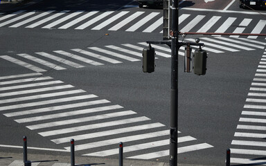 White lines at intersections and pedestrian crossings on asphalt roads in Japan