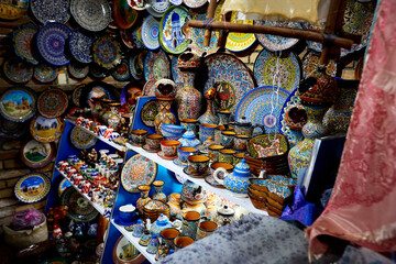 Decorative ceramic plates and cups in Uzbekistan - obrazy, fototapety, plakaty