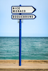 Direction traffic sign for Nice, Monaco and Roquebrune on the coast of the Mediterranean Sea