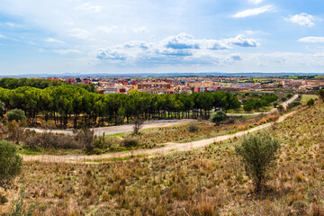 Panoramic view of Figueres city skyline as seen from Sant Ferran castle in Figueres, Catalonia, Spain - 782870273