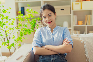 Young Asian woman at home