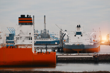 Very Large Crude Oil Carrier Tanker In The Trade Port During Bunkering Fuel Operations.