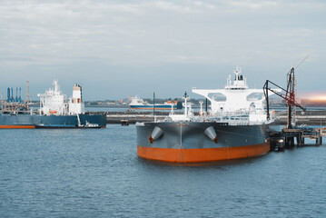 Very Large Crude Oil Carrier Tanker In The Trade Port During Bunkering Fuel Operations. © I am from Mykolayiv