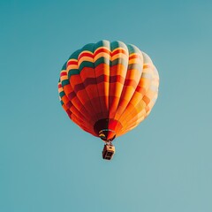 Obraz premium A hot air balloon floats through the sky.