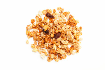 Pile of Muesli oat cereals with raisins, dried fruits and sunflower seeds on white background. Top view