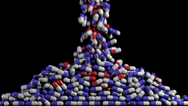 Many capsule pills falling on a pharmaceutical conveyor belt, drug manufacturing. Medical supply manufacturing and packaging
