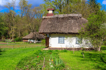 Ancient traditional ukrainian rural house  in Open air Museum of Folk Architecture and Folkways of...